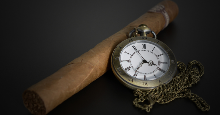 Cigars and a pocket watch